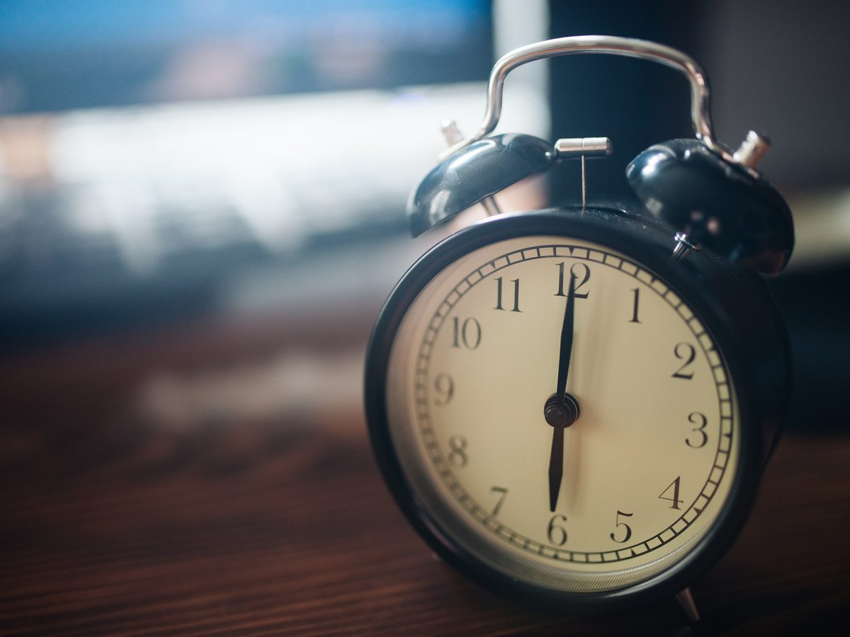 An alarm clock on a table — keep track of time
